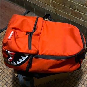 Red Sprayground Backpack